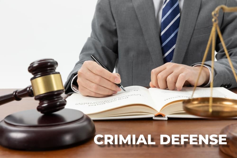 Criminal Defense lawyer reading law book